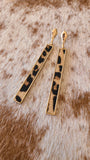 Gold bar earrings inlaid with faux leather in leopard